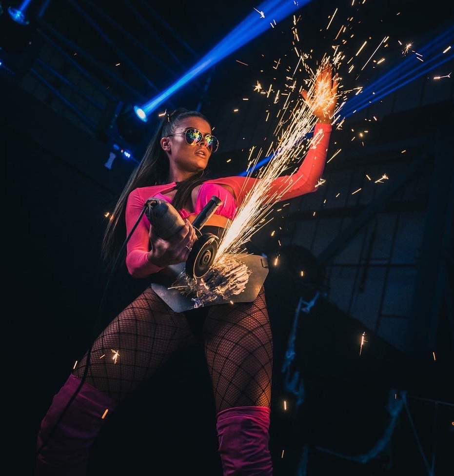 Angle grinder performer act for hire